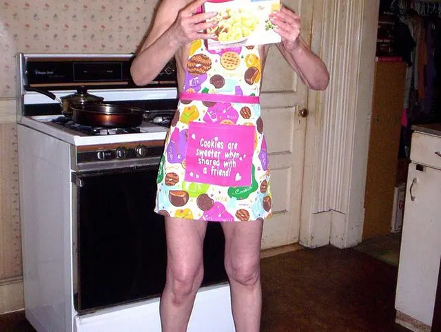 Almost Nude Working In The Kitchen