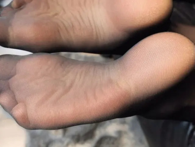 Füße und Fußsohlen in Nylons